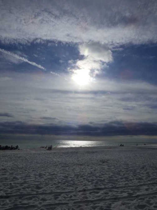 b Sun Coming Through Clouds