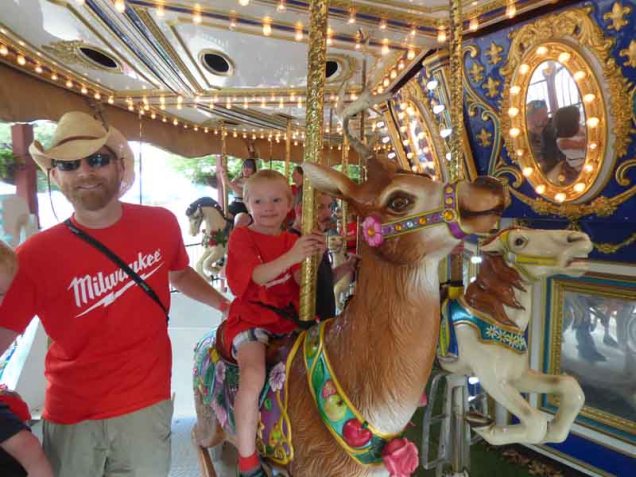 b George and Owen on Carousel