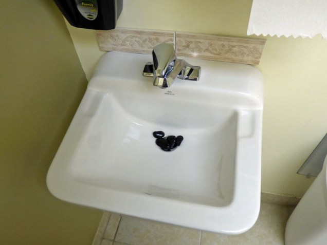b03-stone-in-sink-in-ladies-room